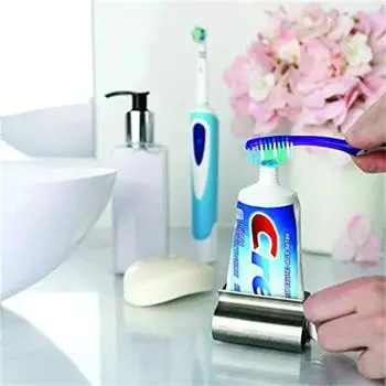 1 шт. Нержавеющая сталь отжимной ролик вращающийся дозатор для мазей косметика аксессуары для ванной комнаты выжималка для зубной пасты роликовый тюбик