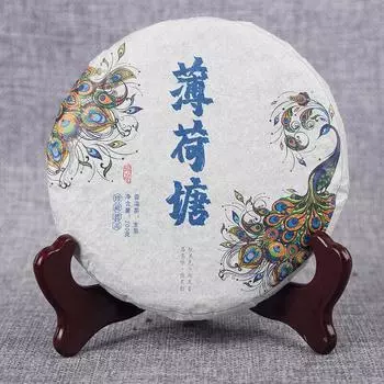 200 г сырого чайного пирога юньнаньского чая пуэр =