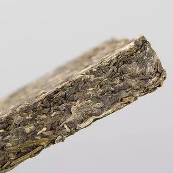 2012 Yunnan Menghai Old Tree Shen Puerh Classical 8582 Сырой чай Пуэр в кирпичиках 250 г 250g