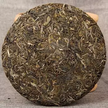 2014 Сырой чай Пуэр Мэнку Древнее дерево Ранней весной Чайный торт Шэн Пуэр ручной работы 357г 357g
