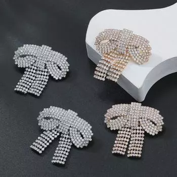 «2024 Элегантные серьги-бантики с бриллиантами: Преувеличенные свадебные украшения в европейском и американском стиле. золотой