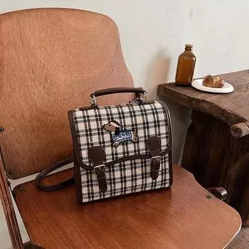 2024 лето новый повседневный ретро рюкзак нишевая мода пригородная женская сумка корейская версия модный рюкзак сумка женская 21*9*19 чёрный