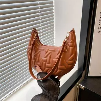 2024 Новая модная нишевая популярная сумка-полумесяц, сумка под мышкой, модная женская простая текстура, популярная сумка через плечо в этом году чёрный