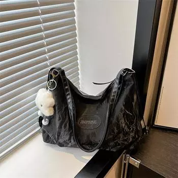 2024 новая простая повседневная летняя модная сумка через плечо для женщин в этом году популярный рюкзак большой вместимости Without pendant чёрный