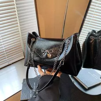 2024 осень новый темперамент повседневная личность сумка через плечо полумесяц модный простой нишевый дизайн пригородная сумка подмышкой чёрный