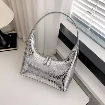 2024 Весенняя новая женская сумка подмышки в форме серебряного полумесяца с роскошным и уникальным дизайном. Универсальная французская сумка на одно плечо.
