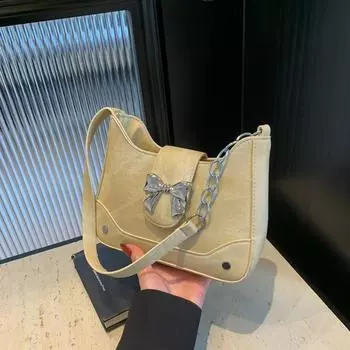 2024 весна и лето новая маленькая сумка с бантом женская простая ins трендовая персонализированная повседневная сумка-мессенджер через плечо с цепочкой бежевый