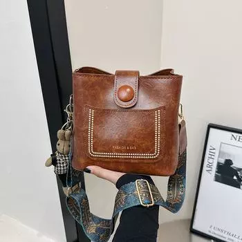 2024 весна новая мода повседневная сумка-ведро нишевая корейская версия ретро однотонная пригородная сумка-мессенджер с широким плечевым ремнем женская сумка Without pendant чёрный