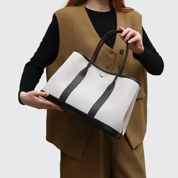 2025 canvas women s new niche handbag fashion leisure commuting large capacity high-end sense contrasting color tote bag