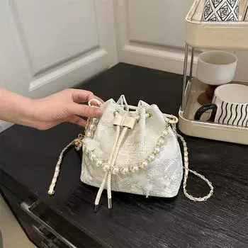 2025 new Chinese bucket bag new cheongsam style pearl portable small bag foreign style Chinese style messenger bag розовый