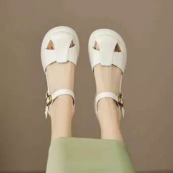 2025 new summer Roman shoes thick heels high heels pig cage shoes women step on shit feeling thick sole hollow bag head sandals tide 35