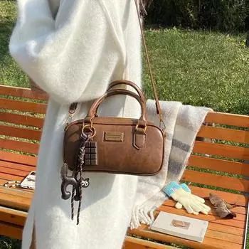 2025 Новая женская сумка Мода Модная сумка Тренд На одно плечо Кроссбоди Портативная Легкая Роскошная Тренд Сумка Однотонная Женская сумка 23*8*12 коричневый