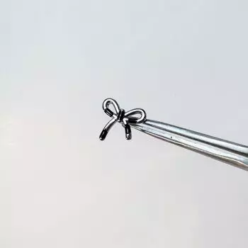 22 Ding Mu Black Heart Ear Ring Earring Ear Clip Titanium Steel Ear Ear Bone Pin Sweet Cool Bow Stud Earrings Female 1# Black color matching Bows stud earrings