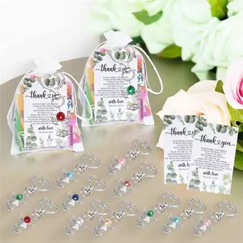 24 комплекта ангельских брелоков, подвески в виде ангелов, подвеска в виде крыла ангела с бирками благодарности, сумка из органзы на шнурке, подарки для гостей