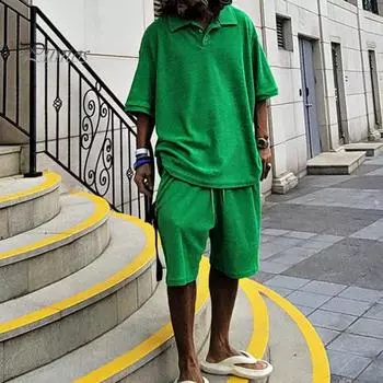 2 шт./комплект мужской летний наряд рубашка с коротким рукавом на лацкане завязками широкие карманы шорты комплект однотонный свободный крой наряд 2XL зелёный