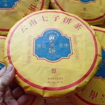 357г Юньнаньский сырой чайный пирог Пуэр 2014 Золотой лист Шэн Пуэр Чай Чайный торт Пуэр