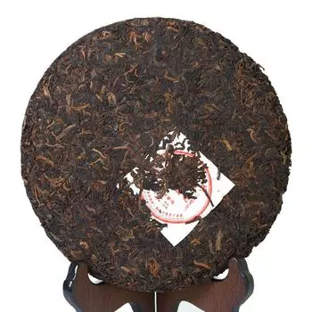 357г Yunnan Gongting Golden Buds Pu - эр спелый чайный пирог: Обладатель золотой медали