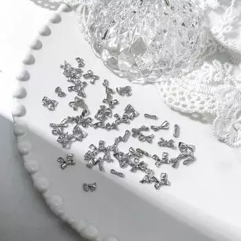 50/100 шт. серебряные металлические банты для дизайна ногтей, 3D-ламповые серебряные/золотые банты, ленты для декора ногтей, аксессуары для маникюра класса люкс своими руками 50PCS серебряный