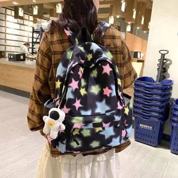 A Color-blocking Striped Backpack for Female High School Students and Junior High School Students with pendant