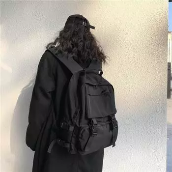 A Male Student with A Large-capacity Backpack From A High School Dormitory