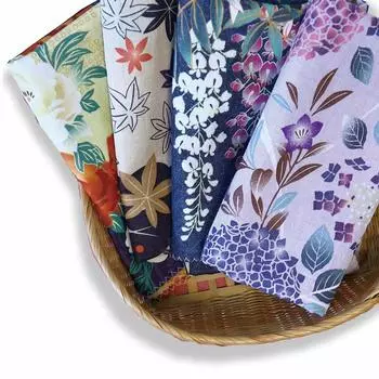 A soft and fluffy tenugui towel made with gauze featuring designs on both sides from a Kyoto Japanese goods manufacturer of triple-layered (set 4).