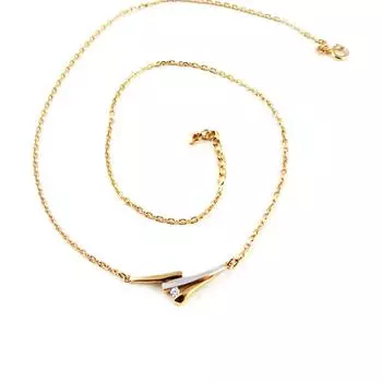 Altesse [L1753] - двухцветное позолоченное колье Hug