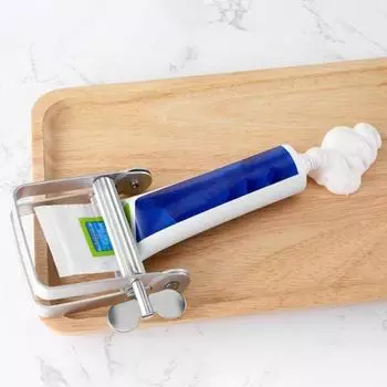 Алюминиевый сплав Выжималка Дозатор зубной пасты Компактный дизайн Портативный отжимной тюбик зубной пасты Ручной роликовый инструмент серебряный