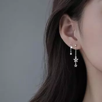 Асимметричные серьги с полыми пятиугольными звездами