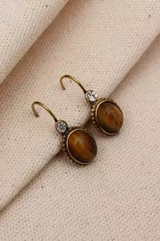 Аутентичные овальные серьги с прозрачным коричневым камнем