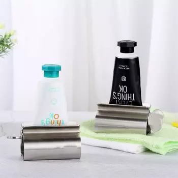 Аксессуары для ванной комнаты Выжиматель зубной пасты Роликовый отжимной ролик из нержавеющей стали Вращающийся дозатор для мазей Косметика серебряный