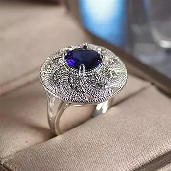 Ажурное резное кольцо со стразами и сапфиром 6