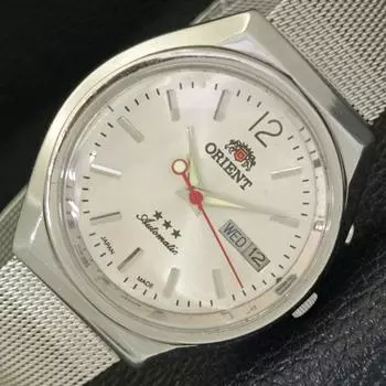 Б/у ЯПОНИЯ ORIENT AUTOMATIC 46941 МУЖСКИЕ ЧАСЫ С СЕРЕБРИСТЫМ ЦИФЕРБЛАТОМ DAY&DATE a432210-2 R110-a432210