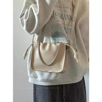 Сумка женская новая модная высококачественная плиссированная сумка через плечо нишевая универсальная портативная сумка-мессенджер чёрный