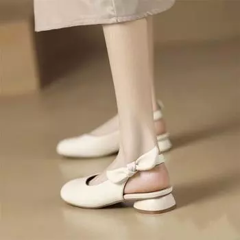 Baotou sandals women s 2025 summer new bow Korean version round head shallow mouth low heel Muller grandma shoes foreign trade 35