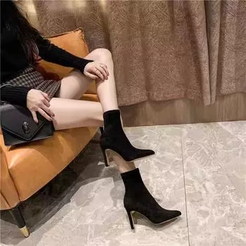 Black pointed tip 2025 autumn and winter new thick heel elastic short boots women s versatile flat heel temperament high heels thin socks boots 35