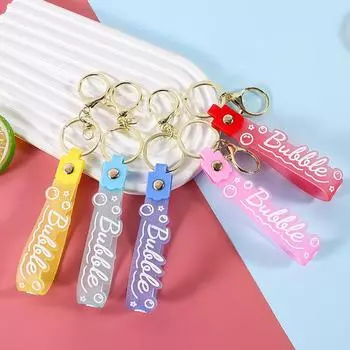 «Блестящий кожаный брелок с буквами и плавающим мультяшным шармом»