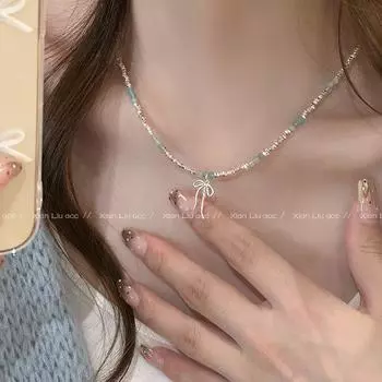Blue Small Pieces of Silver Bows Necklace Fancy Light Luxury Minority Clavicle Chain Female 2025 New Arrival Necklace Ornament Blue Crystal Broken Silver Bows Necklace