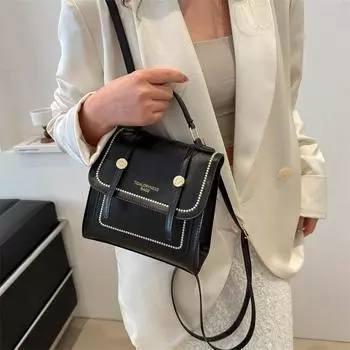 Большая вместимость модный простой темпераментный рюкзак женский весна 2024 новый иностранный стиль сумка для отдыха пригородная сумка-мессенджер прилив чёрный