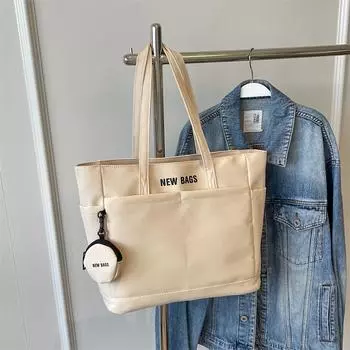 Большая вместительная холщовая сумка-тоут для женщин 2024 года, новая корейская версия, модная простая студенческая сумка для занятий, сумка через плечо