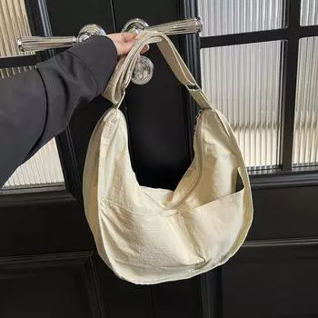 Большая вместительная однотонная женская сумка для поездок на работу и отдыха 2024 года, простая, новая, модная и легкая, в иностранном стиле, через плечо, подмышкой