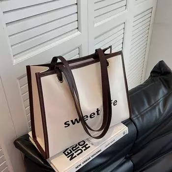 Большая вместительная сумка Женская универсальная сумка через плечо Модная, чувственная Иностранный стиль Сумка-тоут для поездок на работу Сумка-тоут для прогулок чёрный