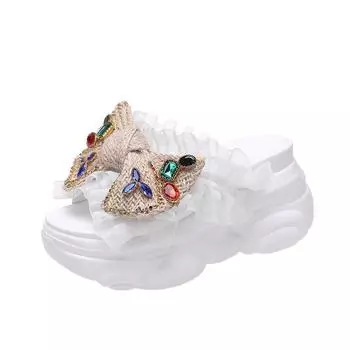 Bow thick-soled slippers for women s summer outer wear 2025 new fashionable rhinestone muffin inner height-increasing slope heel one-word sandals 34