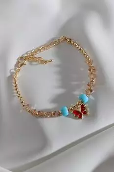 Браслет-бабочка из красной эмали с хрустальным камнем медового цвета