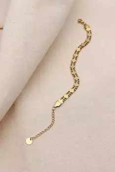 Браслет-цепочка из стали золотистого цвета с клевером