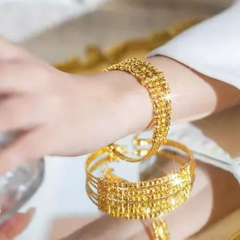 Браслет из трех кругов с позолоченными бусинами