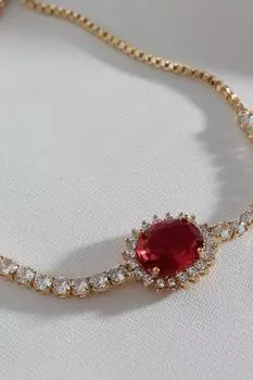 Браслет-лифт водного пути овального красного циркона с камнем Anturage золотого цвета