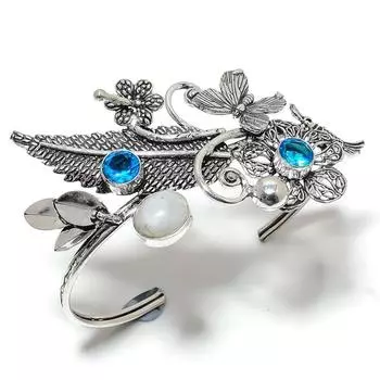 Браслет-манжета из серебра 925 пробы с радужным лунным камнем и топазом. n6w50