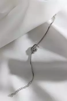 Браслет серебряного цвета с фигуркой слона из циркона