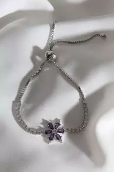 Браслет серебряного цвета с фиолетовым цирконом и каменным цветком