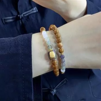 Браслет в виде двойного круга с росписью тушью